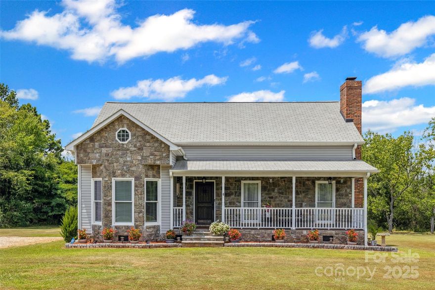 Welcome to your private slice of country living! This beautifully updated and immaculately maintained 3-bedroom, 2-bath home sits on a spacious and level 3.43-acre lot, offering room to roam, relax, and enjoy the outdoors.  Inside, you’ll find a thoughtfully designed layout with the primary suite on the main floor, ideal for ease and comfort. Updates throughout the home provide modern touches while maintaining cozy charm. The inviting front porch is perfect for morning coffee, while the expansive back deck is ready for summer BBQs and evening gatherings.  Love to tinker or need space for hobbies? The HUGE 2200 sq ft detached shop is a dream come true – perfect for projects and storage.  Enjoy the peaceful setting without sacrificing convenience – just minutes to Rock Hill, Lake Wylie, shopping, dining, and commuter routes.  Don't miss this opportunity for space, privacy, and flexibility in a prime location!