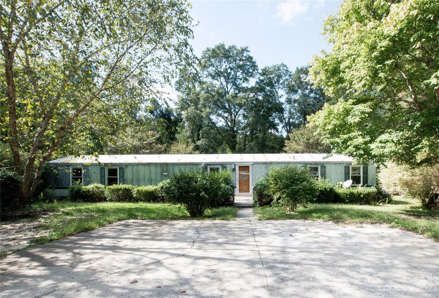 Great opportunity!  4 bedroom, 2 bath home on just over an acre with a shed!  Would make a perfect home with some TLC or a great investment opportunity.  Home is being sold as-is.