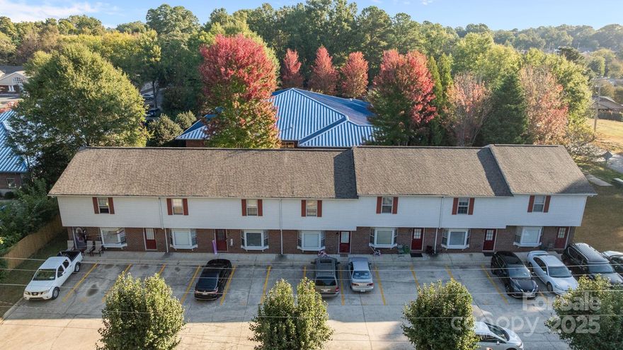 Attention investors! 
Townhome-Style Apartment Building
Excellent opportunity to acquire a well-maintained 7-unit townhome-style apartment building, including an adjoining lot where the parking lot is.
Each apartment unit offers approximately 1,275 square feet of living space, featuring 2 bedrooms and 2 full bathrooms. The first floor includes a spacious eat-in kitchen with abundant cabinet and counter space, a comfortable living room, a full bathroom, and a laundry area. The second floor includes two large bedrooms and an additional full bathroom.
Each unit is equipped with a private rear deck and an attached storage room.
Located in a prime area of Rock Hill, SC, the property is convenient to major shopping centers, dining, the Rock Hill Sports Complex, and nearby medical facilities. It also offers easy access to Charlotte, NC, approximately 30 minutes away. 
 Please do not disturb the tenants. Rent roles and plat attached in MLS