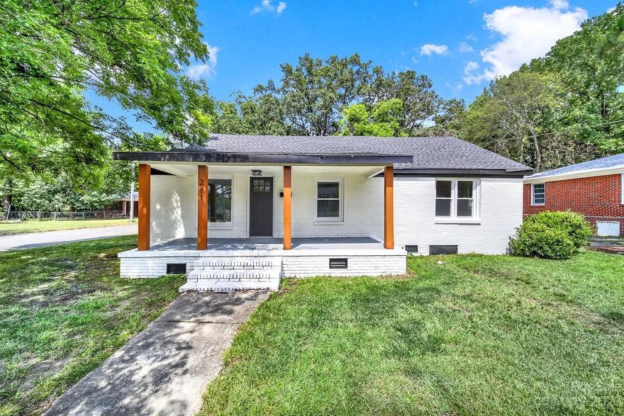 Welcome to your dream home in the heart of Old Town Rock Hill! This stunning 3-bedroom, 2-bathroom brick ranch with modern farmhouse style offers rustic charm with updated amenities and designer-selected finishes. This home has been thoughtfully renovated and features all new electrical wiring and panel, updated plumbing, new water heater, all new vinyl insulated windows, new HVAC, waterproof luxury vinyl plank and fresh white paint throughout. The kitchen boasts new white shaker cabinets, butcher block countertops, stainless appliances, floating shelves and shiplap. Oversized family room, primary bedroom with ensuite bath, additional hall bath with tub, and two additional bedrooms round out the home. Both bathrooms feature custom tile showers and designer vanities. Covered front porch and large back deck are perfect for relaxing with family or entertaining guests. Come see this one today! Please note - 3rd bedroom does not contain a window and is deemed an "office" on building permit.