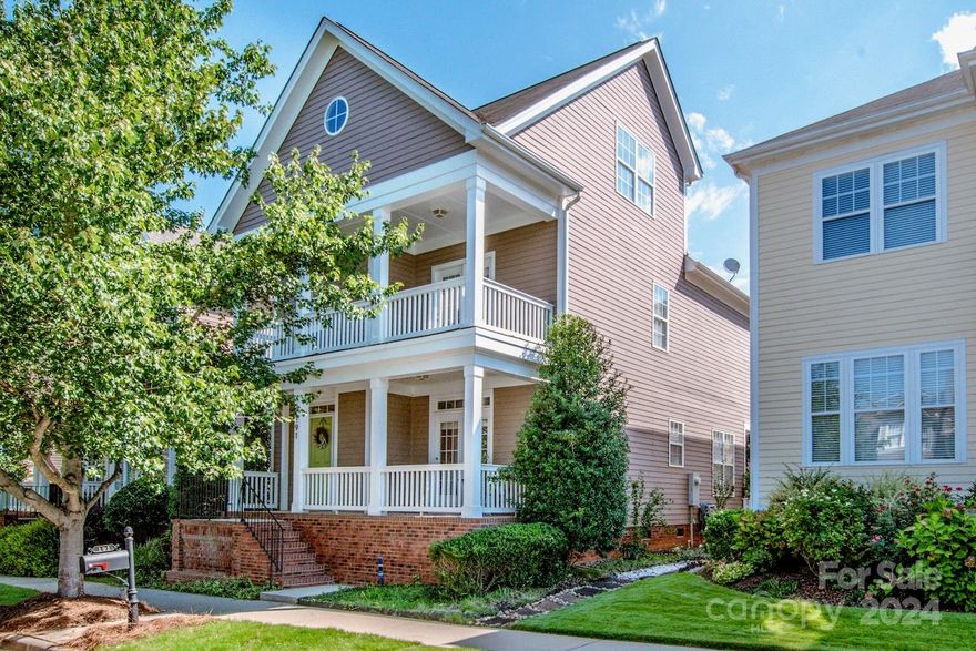 Get ready to experience the laid-back vibes of "Island Time" as you step into this serene neighborhood situated on Lake Davidson! Just a block away from the lake and community facilities, this charming home exudes southern hospitality. With a double covered front porch that extends the front view, the open floorplan on the main level is ideal for hosting gatherings. The main level features hardwood floors, white kitchen cabinets and stainless steel appliances.  the fenced backyard boasts mature landscaping.  This Charleston-inspired community provides lake access, recreational activities, and stunning sunset vistas. Relax by the lakeside pool during your leisure time. The cabana by the lake is perfect for picnics or larger gatherings. Ample green space for play and pets, along with walking trails surrounding this picturesque community.