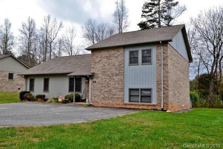 Townhouse living at its best.  Conveniently located a few miles off I-40 exit 81 and Super Walmart, near US 221/226 ByPass, within walking distance to McDowell Hospital, YMCA and sidewalks to downtown Marion. This easily maintained home offers 2 bedrooms, 1 full bath on top level. Both bedrooms are quite spacious with the Owner bedroom having a nice sized walk in closet. The lower level features a large open Den with Tile floors, a half bath, an Italian inspired Kitchen with granite countertops, Eat-in Dining area, Coat closet, Pantry and laundry closet. Sliding glass door off of dining area goes out onto the back patio. Detached Outbuilding included with new metal roof located off of the back Patio. Call today to schedule your very own private showing appointment. Seller is a NC REALTOR