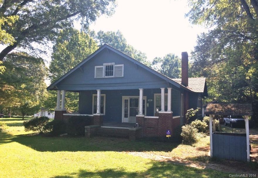 Adorable Craftsman Style Bungalow on a large 1+ acre flat lot features all the unique character & characteristics of that time period, including hardwood floors, large rocking chair front porch, custom built-ins, etc.  Includes a detached 1-car garage/workshop.