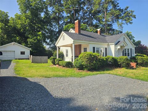 Photo of 917 Main Street, Locust, NC 28097 (MLS # 4401215)