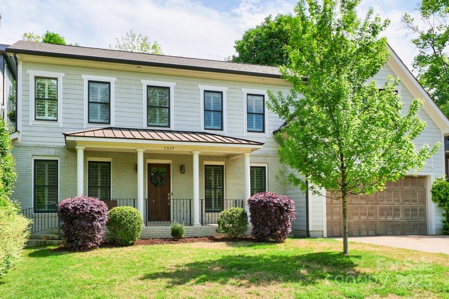 Dilworth living at its finest, welcome home to this charming 5BR/3.5BA two-story home in one of the city's most sought after neighborhoods. Hardwood floors throughout main level, stairs and upstairs hallway. Desirable first-floor primary suite features updated spa-like bathroom with dual vanities, newly tiled glass-enclosed shower and large walk-in closet. Bright and modern kitchen boasts slide-in gas range, tiled backsplash and kitchen island. New wainscoting in dining area complements main living area. 9' ceilings throughout. Upstairs, large secondary bedrooms and spacious bathrooms, perfect for family or guests. Rare 5th bedroom/bonus room, two-car garage and ample basement storage. Back patio is your private retreat, complete with stone pavers, hot tub, and pergola with flowering jasmine. Front yard is steps from Latta Park and East Blvd shops and restaurants. Minutes from Freedom Park, top hospitals, Uptown and South End, a rare value in one of Charlotte’s most desirable areas!