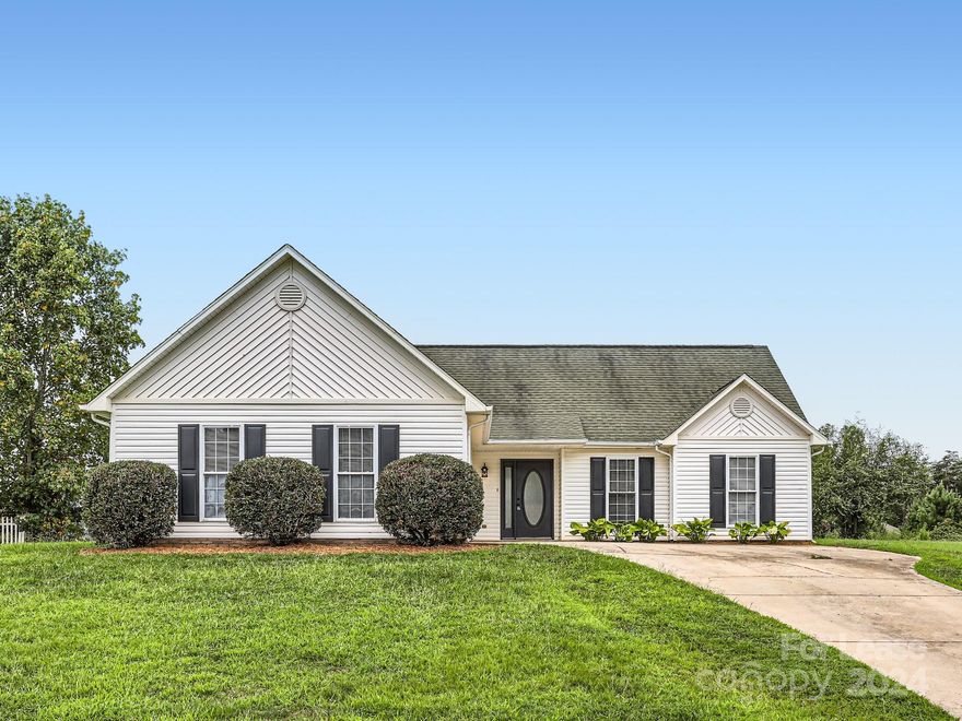 Beautiful single story ranch home with great split floor plan, 3 bedrooms and 2 bathrooms. Open concept with vaulted ceiling in the living room and lots of natural light. Large primary bedroom has a en-suite bathroom with large garden tub and separate shower. Home has been freshly painted and updated. Dog Friendly! All breeds welcome! Located in a quiet neighborhood near the cul-de-sac. LARGE lot with flat back yard. Two car garage. This comfortable home truly does have it all and is in a terrific, convenient location in Sherrills Ford. It's less than a 5 minute drive to the newer Publix shopping complex! Very close to Lake Norman, marinas and the beautiful new Mountain Creek State Park on Lake Norman!