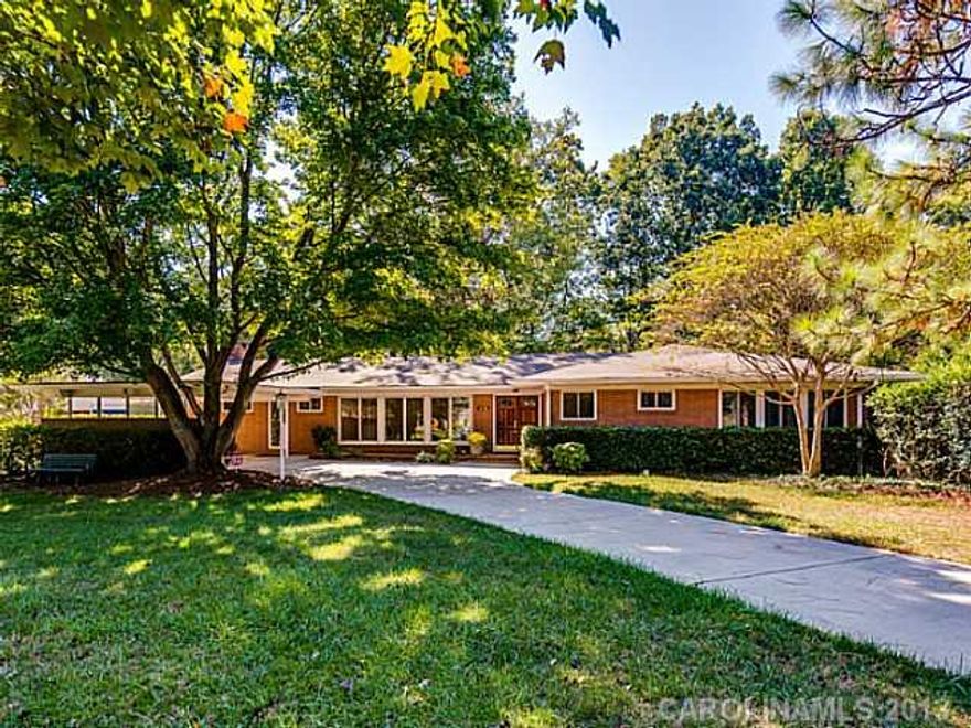 One of the "coolest" homes in Mountainbrook!  Classic mid century modern home on over .5 acre private and wooded lot.  Huge master suite with dual walkin closets. Large secondary bedrooms.  Updated kitchen with cherry cabinets, stainless steel appliance, gas cooktop.  Tile floors in foyer, kit., and dining room.  Spacious great room with vaulted ceiling. Spectacular patio overlooking fenced yard.