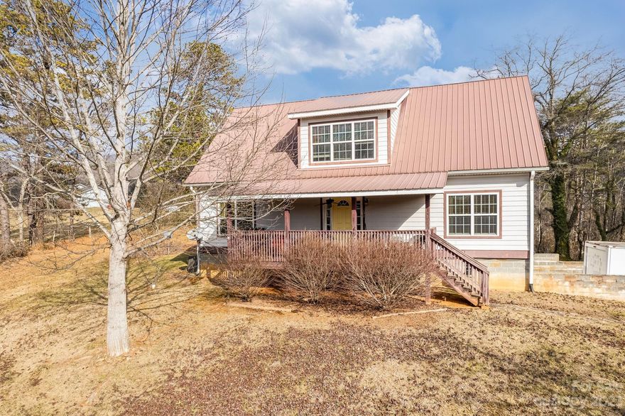 Looking for a home in a serene country setting? Look no further! This well-maintained 3 bedroom, 2.5 bath home is nestled on an acre of land and features an open floor plan, spacious primary bedroom and ensuite on main level, covered front porch, loft/bonus room upstairs, full basement, long range mountain views, and more. Recent updates to the home include a new water heater and stainless steel refrigerator. Only minutes from the interstate and a short commute to Canton, Waynesville and Asheville, the options for local shops and restaurants are endless. This home is being sold as-is.