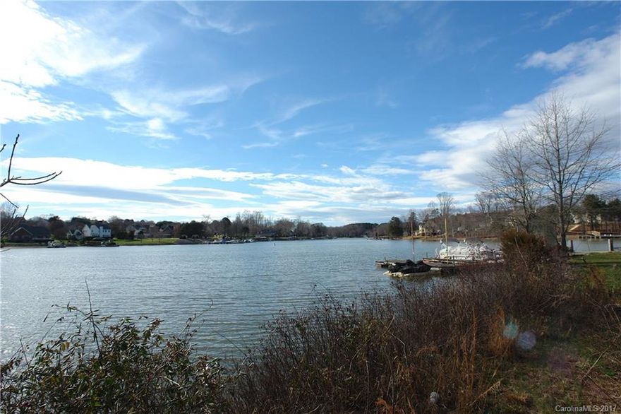 LOCATION, LOCATION, LOCATION in this beautiful waterfront lot in the gated Reserve at Morrison Plantation.  CITY water AND sewer! Gently sloping and cleared, this lot is convenient to Mooresville amenities yet so peaceful.  Property meets all dockability requirements with Duke Energy.