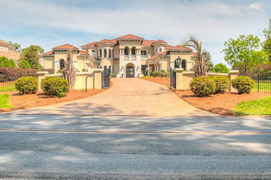 Stunning new Mediterranean Custom home on 1.35 waterfront acres. Home is appointed with the finest materials. A 5 car garage 2 full kitchens,3 wet bars, 6 BR,2 laundry rooms,media room,exercise room, lake level rec room,2nd level rec room, hotel sized veranda w/wet bar and fireplace, 2 pools, spa, numerous balconies, wine room, pier,covered sitting area,dock. Huge owners suite!