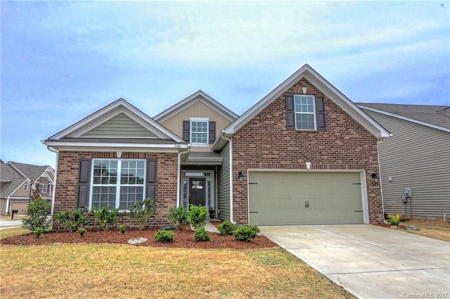 Welcome Home...Beautiful Corner Lot offers Large Master suite down w/upgraded master bath with granite counter tops, Large upgraded shower, additional 2 bedrooms and full bath w/granite on 1st floor. 4th Bedroom/Bonus upstairs boosts a large bath w/granite double bowl sinks and large walk in closet. Gourmet kitchen, double ovens, gas cooktop, granite countertops, & hardwoods throughout. Gas Fireplace. Covered Rear porch w/beautiful paver patio w/fire pit. Walking distance to club house/pool.