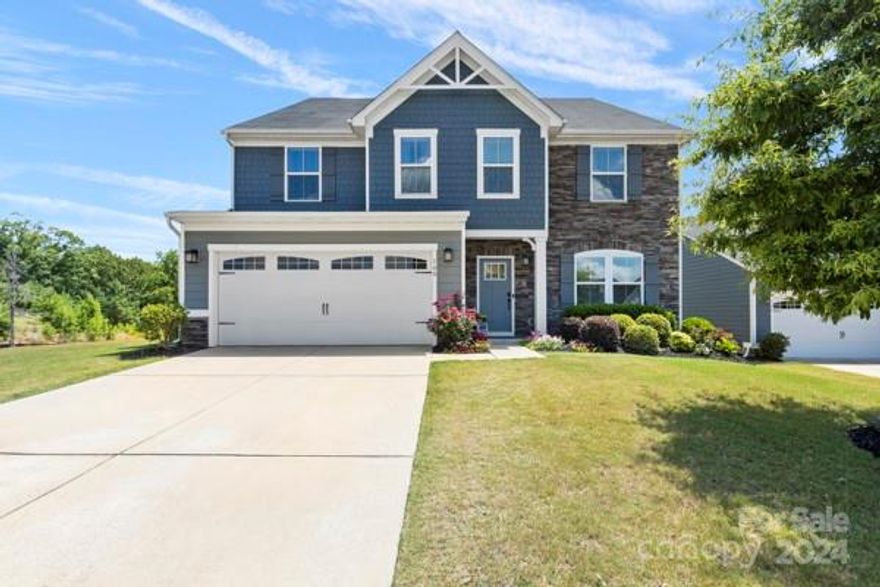 Multigenerational gem featuring 6-bed, 5.5-bath on a corner lot. Enjoy ultimate privacy with a backyard bordering a tree line that cannot be built upon. Discover your own oasis with your in-ground pool and well appointed yard. The immense kitchen features ample storage and an oversized island. Large split level floor plan grants privacy while ensuring ample space for all. The third-floor ensuite includes a living area, providing additional comfort. Perfect for large families seeking room and privacy. Please note that the carpets on the second level are being replaced on July 17th.