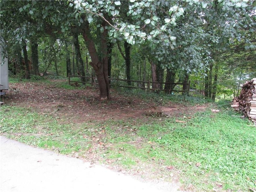 Portion of pin number 0619-19-6382-00000 Recently subdivided, new survey to be recorded. Walkable to downtown Black Mountain and Lake Tomahawk.