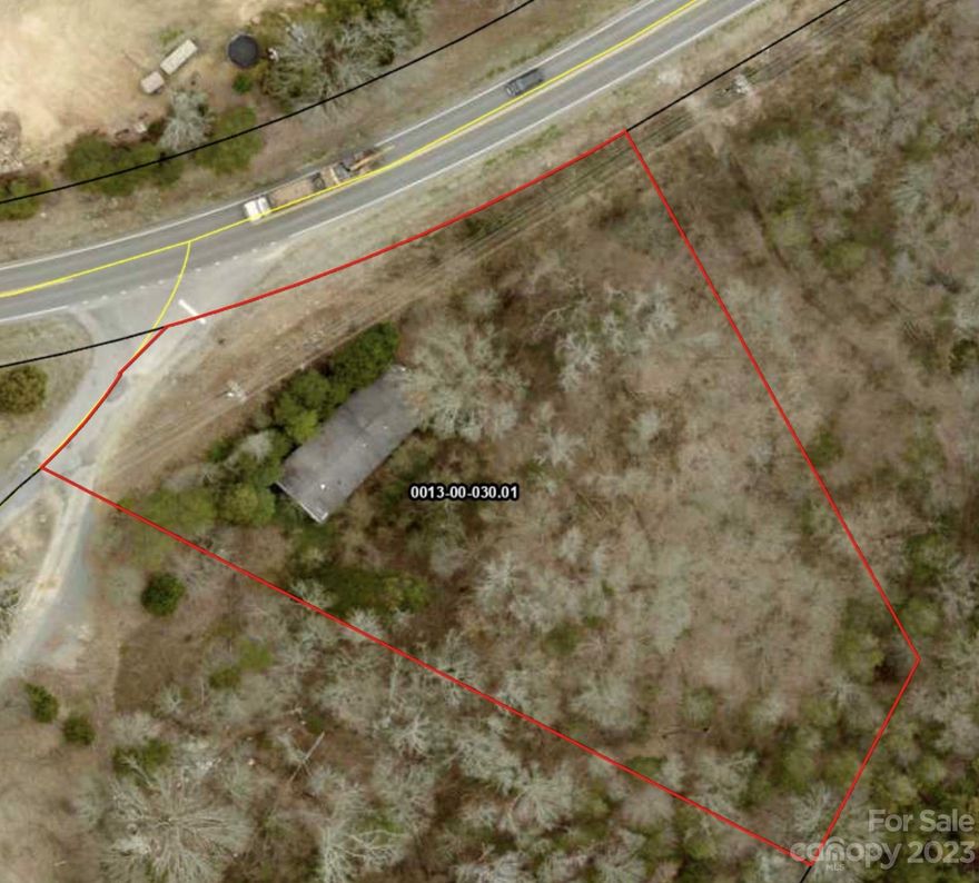 Building lot in desirable Indian Land!  Close to everything in Indian Land and to the Catawba River!  Located on Doby's bridge Rd but driveway is on side road for easier access to the property.  Property is set down off the road a bit for privacy.  There is currently an uninhabitable mobile home on the property that will need to be removed.  There was septic on the property but unsure of status and no septic permit was available from the county.  County water is available.  New home would need to be modular or stick built per Lancaster County.  Buy this lot today for less than tax value!
