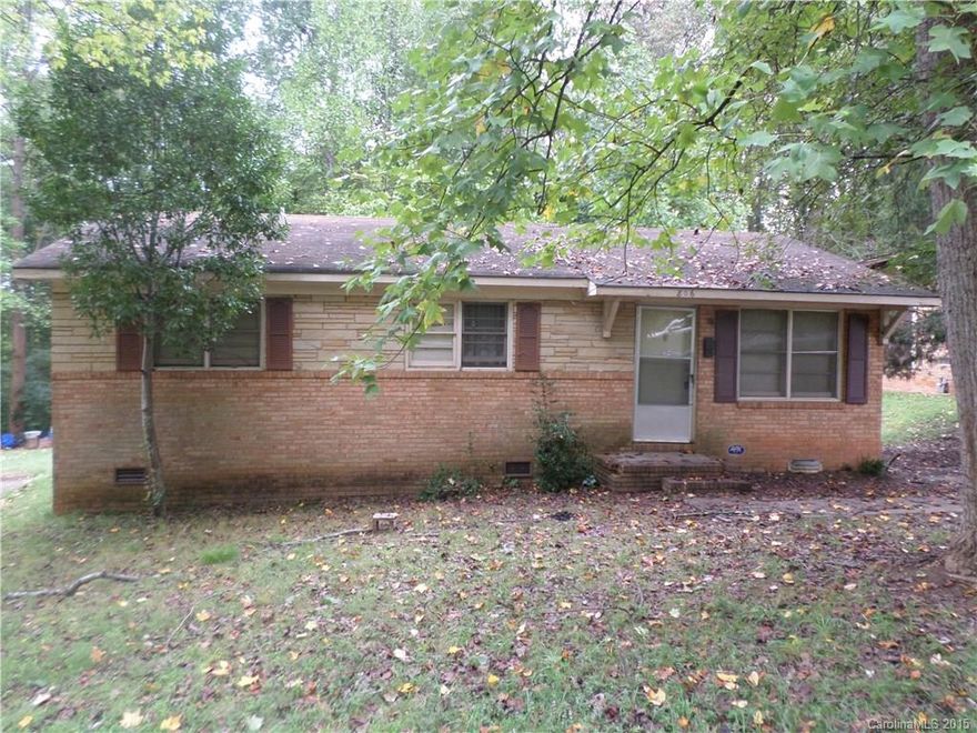 Brick home on large lot. 2 bedrooms, 1 bath. Near shopping, restaurants and schools.