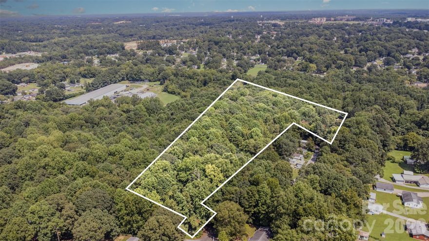 Approximately 14 acres located just 2 miles from downtown Kannapolis, offering excellent potential for future residential development or long-term investment! The property is conveniently positioned near Kannapolis Parkway and I-85, providing easy access to Charlotte in about 30 minutes. Nob Hill Drive dead ends into the property, and there is potential to extend a roadway from Kenlough to create a new neighborhood entrance. The land features a sloped topography that could lend character to a well-planned community. City water and sewer are nearby, though utility extensions will be required. The current owner has already completed an extensive amount of due diligence and preliminary planning, giving the next buyer a strong foundation to build upon. With its location, size, and surrounding growth, this property offers significant upside for a buyer with a vision!