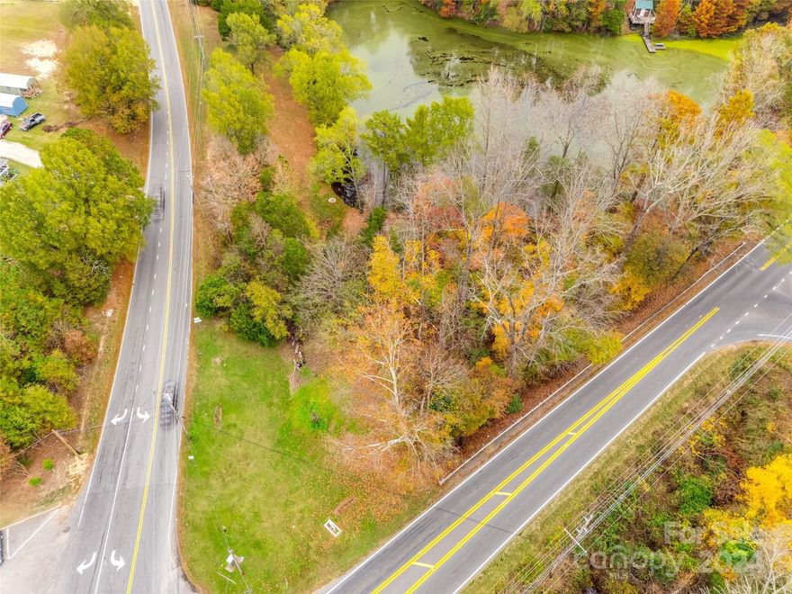 Price reduction!!!!!  Motivated seller!!!!  Bring your offers!!!!  Discover the potential of this corner lot, strategically located at the bustling intersection of Highway 73 and Gold Hill Road. Zoned B-1, this property offers incredible versatility for a variety of business ventures.  There is a large easement at the front of the lot, and an unidentified pipe located at the back of the property.  Maximize visibility and accessibility with this high-traffic spot.  With its excellent positioning and zoning flexibility, this lot presents a fantastic investment for savvy developers and entrepreneurs. Bring your vision to life in this high-growth area!