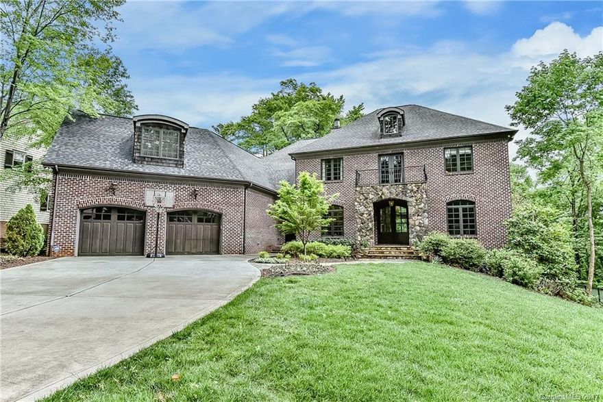 Beautiful custom home by Gerrard Builders on 1/2 acre lot that backs up to Freedom Park. 4 BR, 4.5 BTH. Open floor plan w/large family room w/double sided stone fireplace that opens to gourmets cook's kitchen. Formal dining/living room, guest suite down, MBR upstairs w/two BR's, Jack & Jill BTH w/den plus bonus room w/full bath & wet bar. 2 laundry rooms. Unfinished basement could be easily finished. Great screened in porch, +patio & private backyard! This home has it all and is move in ready!