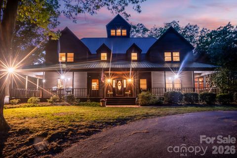 Photo of 300 Cottonstone Lane, Troy, NC 27371 (MLS # 4374576)