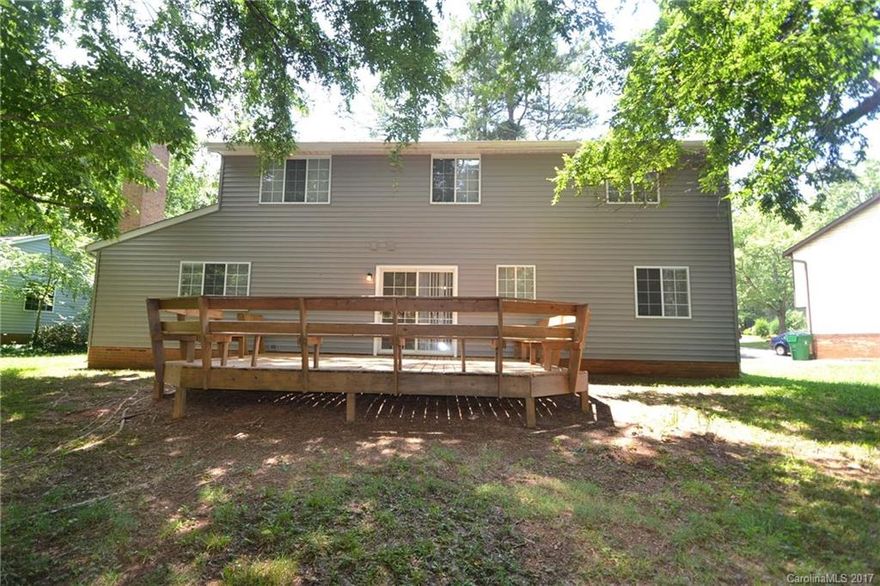 Enjoy the large deck for entertaining, overlooks large backyard. The den is open to kitchen and breakfast area. Two car garage has extra storage & workspace. *NC2C0658