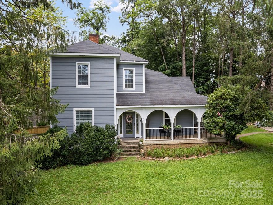 Come explore this classic Victorian home, perfectly situated for an effortless lifestyle. Step out your front door and enjoy a short stroll to the heart of downtown Waynesville, where you can explore shops, dine at local restaurants, and enjoy year-round entertainment. This home has been renovated inside and out, blending timeless charm with modern convenience. You'll find a new roof, siding, and windows. The beautifully updated kitchen and two full baths feature contemporary finishes that complement the home's historic character. Inside, the main level welcomes you with a grand foyer that flows into the living room, a cozy den, a separate dining area, and the primary bedroom. Upstairs, two generously sized bedrooms await, along with a sitting area that includes a walk-in closet and another full bath. Outside, the fenced yard and thoughtful landscaping create a private, tranquil retreat. Enjoy tranquil mornings and evenings on the lovely, covered porch while taking in views of the city and the majestic WNC mountains. This home is a rare gem, offering classic elegance and an unbeatable location.