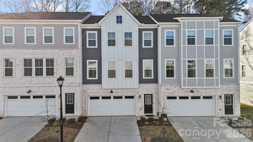Location truly doesn’t get better than this. Situated in the highly desirable Ballantyne area, this stunning townhome in Roseglen offers unbeatable convenience—just minutes to shopping, dining, and I-485—while delivering the lifestyle and charm today’s buyers are looking for.
The Dana floor plan features a thoughtfully designed 3-story layout with 3 bedrooms, 3 full bathrooms, and a half bath, all centered around a bright, open-concept living space. The kitchen is the heart of the home, showcasing a large quartz island that flows seamlessly into the main living area, perfect for everyday living and entertaining. The inviting family room is anchored by a cozy fireplace, creating a warm and welcoming atmosphere.
Upstairs, the spacious primary suite offers a relaxing retreat with a large walk-in closet and a well-appointed bath. The home also features a versatile lower-level rec room—ideal for entertaining, a media space, or guest suite—along with a main-level pocket office perfect for working from home or tackling daily tasks.
Enjoy beautiful spring afternoons on your screened deck, making this home as functional as it is comfortable. Move-in ready and ideally located, this is Ballantyne living at its best.