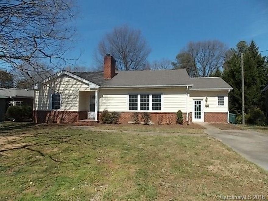 Nice Vinyl and Brick Ranch Home with Fireplace in Living Room, Dining/Den area and Laundry Room off Kitchen. Neutral Color Scheme and Hardwood Floors Make this Home Special. Concrete driveway.