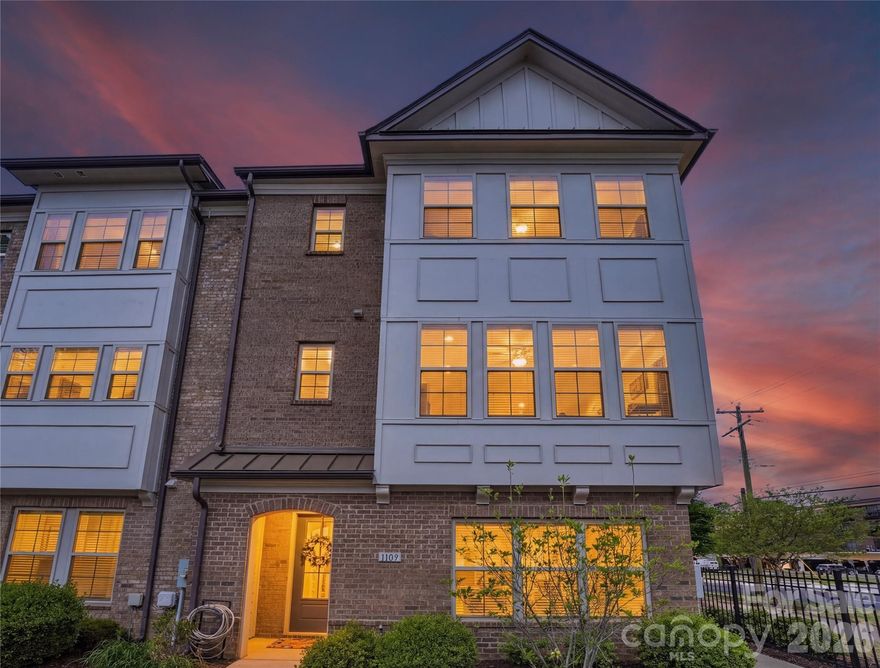 Luxury end-unit townhome in the heart of Madison Park, just steps from Park Road Shopping Center, Montford Drive and the light rail with easy access to Uptown. Located in an intimate community of only 38 brick townhomes built in 2019, this nearly new residence offers the perfect blend of style, space and convenience. Spanning three levels, the home features an attached two-car garage with epoxy flooring, a main-level en suite bedroom and two spacious suites on the upper level. Thoughtfully designed with 9-ft ceilings throughout, LVP flooring, stainless steel appliances and an open-concept layout ideal for modern living. Your gourmet kitchen boasts a large island, pantry and flows seamlessly into the living and dining area. Oversized sliding glass doors lead to your private balcony. Both upper-level suites offer generous walk-in closets and well-appointed bathrooms with walk-in showers. The primary suite includes a unique versatile flex space ideal for home office, gym or to build out more closet space. An exceptional home to own nearly new construction in one of Charlotte's most desirable and walkable locations.