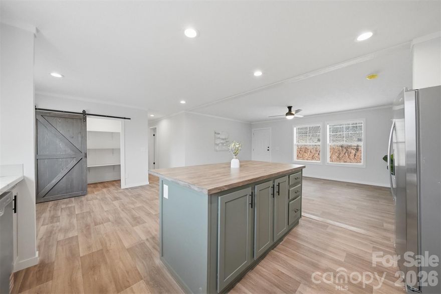 Welcome to this beautiful new home located at 4186 Maple Trail in Morganton! This 3-bedroom, 2-bath residence offers approximately 1,493 square feet of thoughtfully designed living space situated on 1 acre of land. The home features a bright open floor plan that seamlessly connects the living, dining, and kitchen areas—perfect for everyday living and entertaining.

Enjoy a modern interior with neutral colors throughout, creating a warm and inviting atmosphere ready for your personal style. The spacious primary suite includes a private bath, while two additional bedrooms provide flexibility for family, guests, or a home office.

Step outside to relax on the front and rear decks, offering great spaces for morning coffee or evening gatherings while enjoying the peaceful surroundings. With new construction, an open layout, and plenty of outdoor space, this home is ready for its first owners.

Don’t miss the opportunity to make this beautiful property yours!