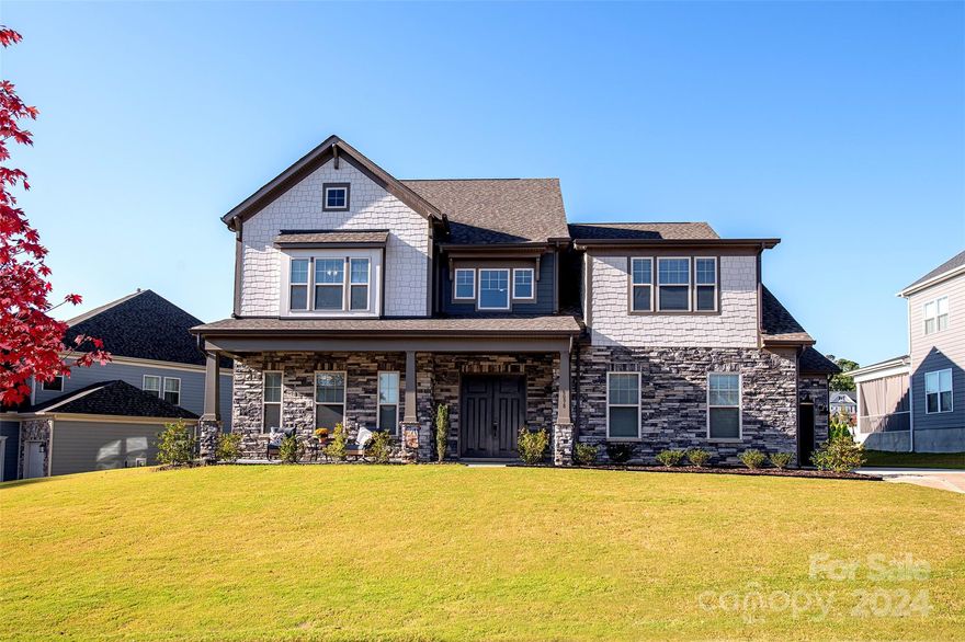 Check out this STUNNING two-story home, built in 2022, that perfectly blends modern elegance w/ functional living. This expansive residence features a large family room complete with a cozy gas fireplace, seamlessly connecting to a gourmet chef's kitchen & a bright breakfast area, ideal for both entertaining & everyday living. The luxurious owner's suite boasts tray ceilings & an ensuite bathroom equipped w/ an extended walk-in shower & dual primary closets, providing ample space for your belongings. The main floor also includes a guest suite w/ a full bath, a formal dining room, & convenient laundry & mud room. Ascend to the upper level to discover three additional bedrooms, a generous loft, & a spacious bonus room, ensuring plenty of room for family & guests. Tons of storage w/ two walk-in attic spaces, perfect for holiday decorations or luggage. Enjoy outdoor living on the screened-in back patio overlooking a large backyard, complemented by a 3-car garage & a charming front porch.