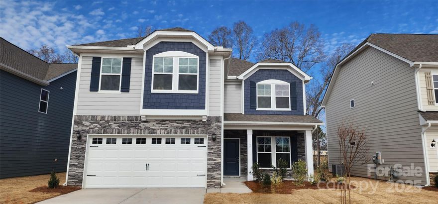 Brand new community in the up and coming area of York, SC. McFarland Estates offers beautifully designed floor plans that includes Hardie® Color Plus siding with designer accents and extensive brick or stone front elevations. This unique community is nestled in a serene location that is conveniently located to shopping and dining. The Liberty home offers a kitchen with an eat in island and a cozy breakfast nook that is open to the family room making it perfect for entertaining. Your guest will be stunned with the professionally designed kitchen that is finished with stone gray colored cabinets, granite countertops, a gas range, over the range microwave, and dishwasher. Primary bedroom with en-suite, 3 secondary bedrooms, secondary full bath with double sink vanity, laundry room and a flex space finish out the 2nd floor of this stunning home. Laminate on the 1st floor, tile in the primary bathroom, quartz or granite tops and stone gray cabinets throughout.