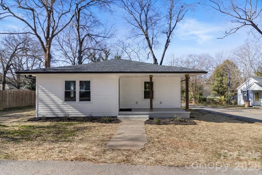 This stylishly remodeled 2-bedroom, 2-bath home is a dream!! The primary suite features a private ensuite bath, while the open-concept layout is filled with natural light from new windows. Enjoy peace of mind with all-new HVAC, plumbing,  electrical, roof and gutters. The warm kitchen offers stainless steel appliances with large pantry.  Enjoy the added storage in the separate laundry area. A beautifully updated, move-in-ready home at an exceptional value could be your new home for the new year!