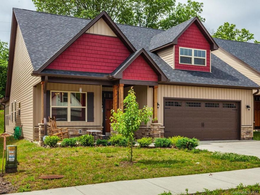 Beautiful Craftsman home in the Oakley Cottages neighborhood! One level living at it's best, with sunroom, open floor plan with lots of light, minutes from downtown Asheville. Short bike ride to nearby shopping or coffee. Large master bath with garden tub and additional shower. Cozy gas fireplace in living room and HUGE two car garage with plenty of extra storage space. Year round mountain views! Move in ready!
