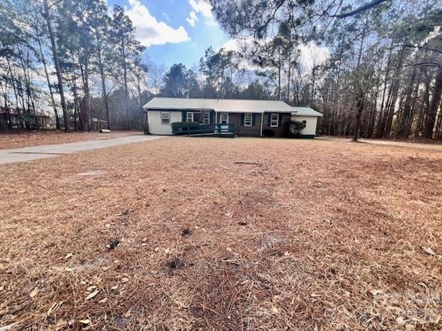 Well-done ranch offers you space inside and outside!  Enjoy mornings in the front living room/home office quietly sipping coffee while the sun streams through the windows.  Gatherings will be a blast with a sizable bonus room and family room hugging the updated kitchen.  Speaking of, this kitchen is fully outfitted with stainless steel refrigerator, stove, dishwasher and microwave as well as plenty of storage.  On rainy nights, the drops on the metal roof will sing you to sleep and on sunny days, enjoy chilling outside on your .71 acre lot.  All the peace and quiet you could want and located close to local eateries and parks.
