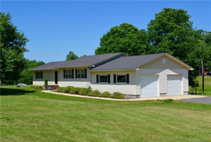 Car enthusiasts take note! Oversized 2 car garage & workshop. Well maintained ranch, over 2 acres. Remodeled kitchen offers dual basin sink, new counters, dishwasher & microwave. Fresh paint throughout. Water filtration system. Parquet floors in the spacious master & living room. Plenty of storage with a walk-in closet in master, double closet in 2nd bedroom & partially floored attic. Enjoy overlooking your huge back yard on a newly floored & painted deck. Convenient country living at its best!