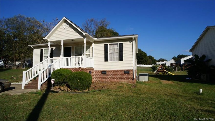 Nice vinyl home with 3 BR & 2 BA. Open floor plan with popular split bedroom design. Extra storage in attic and very large laundry room. Nice front porch for sitting and a convenient concrete walkway around the home. Large wood deck in back, perfect for entertaining. Seller offering $3500 floor allowance with acceptable offer.