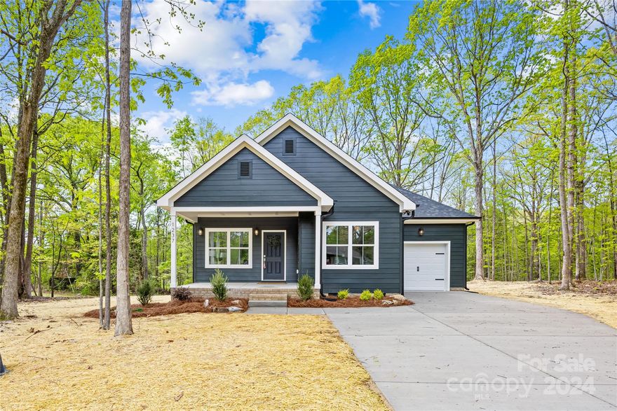 **$7500 Closing Cost credit with acceptable offer** Discover perfection of single-story living in this charming home nestled just minutes from Rock Hill. Situated on a sprawling parcel of one acre, this property offers ample space for outdoor activities while maintaining an intimate feel. Step inside to find a meticulously designed interior boasting a well-designed open floorplan, a dedicated mudroom for added convenience, a primary suite featuring a walk-in closet, plus a second closet in the primary bathroom, including a bonus seating area for added luxury. With a seamless blend of functionality and contemporary design, this turnkey gem promises low-maintenance living without compromising on style. Welcome home to your perfect blend of comfort and sophistication. Added bonus, this one is USDA eligible.