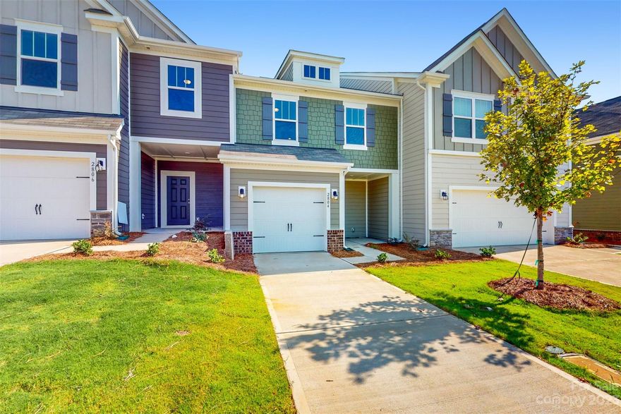 Welcome Home to this charming Wylie townhome w/ 1601 sq. ft 3 BR, a 1-car garage, a private back patio. Whether you make your way in through the 1-car garage or the front door, you'll find yourself in the foyer. Step past the powder room and into the main living area, where you'll find your kitchen, dining area, and family room. Your kitchen features an abundance of counter space w/ a center island. Prep your favorite meals and serve them in the adjacent dining area or outside on the back patio that backs up to a wooded area to enjoy your meal in the fresh air! Head upstairs and find all 3 bedrooms, a full hall bathroom, and the second-floor laundry room. Your owner’s suite sits at the back of the townhome and features a tray ceiling and WIC across from the bathroom, which comes with a shower, and a double vanity. You'll love the designer features including granite tops in the kitchen w/tile backsplash and low maintenance laminate throughout 1st floor