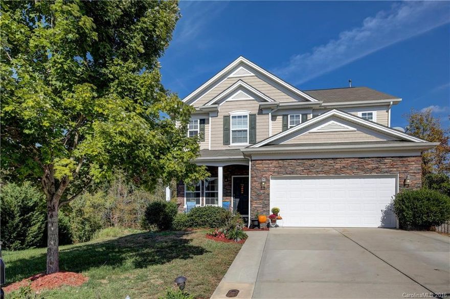 You'll love coming home to this amazing open floor plan perfect for the large or growing family!! This one has all of the most desirable features! Hardwoods, spacious rooms, gourmet kitchen with double oven/gas range and a large bar perfect for entertaining. Cheer on all of your favorite teams in the incredible basement that includes a bar, office/study, bedroom & bath and huge recreation room! Easy commute to 77 and Charlotte, Award winning FM Schools and NO city taxes!!!