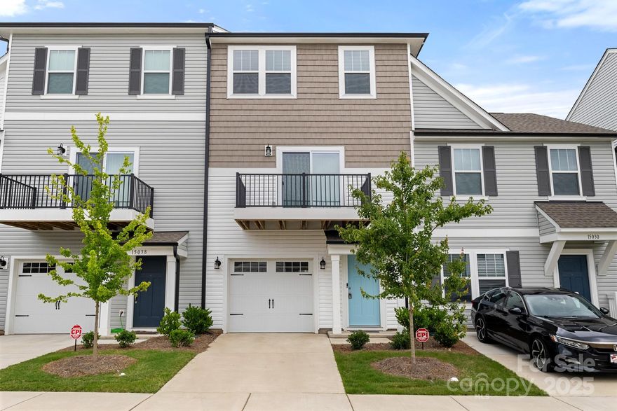CUTE 3 Story townhome in GREAT location in Mallard Creek! Main floor is BIG 2 car garage! Upper floor hosts LVP Flooring throughout all main living areas! OPEN floorplan with plenty of room for entertaining between the spacious Great Room, Kitchen, and Dining Area. Kitchen is STUNNING w/white shaker cabinets, beautiful granite countertops and SS Appliances! AWESOME balcony right off the kitchen as well! THIRD: The third floor is home to all 3 bedrooms and the laundry room. Each bedroom has plush carpeting! The Primary Suite is BIG and features bathroom w/single vanity and walk-in tile shower! Both guest rooms are ample in size and share the additional full bathroom w/single vanity and tub/shower combo. Lots to enjoy about this home- come see it today!