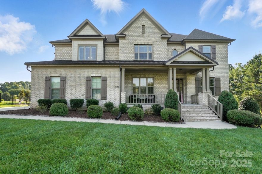 Meticulously cared for & loaded w/$110K in new upgrades, UPSCALE Smart Home nestled on 1.06 acre quiet, cul-de-sac lot, boasts an open floor plan & spacious GOURMET KITCHEN-chef’s dream w/Sub-Zero fridge, Wolf gas cooktop & more. Enjoy chic, quartz countertops & ample 42” cabs, along w/bar seating. Kitchen flows into great room w/automated shades & access to the covered porch w/retractable screen. Love the office w/French doors, crown molding & built-ins. Gorgeous dining room w/wainscoting leads to Butler's pantry w/glass cabs across from  custom wine room w/155 bottle wine fridge. Main level guest suite w/full bath & extra flex room. Exquisite wood tread staircase w/large windows peer out to lovely horse farm. 2nd floor large primary suite features light filled bedroom, spa bath, 2 walk-in custom closets; 3 secondary bedrooms & a cozy loft. 3 car side garage w/ car charger, NewAge Cabs, SafeRacks, slat walls, bike racks & modular floors. Weddington schools. Pride of ownership abounds!