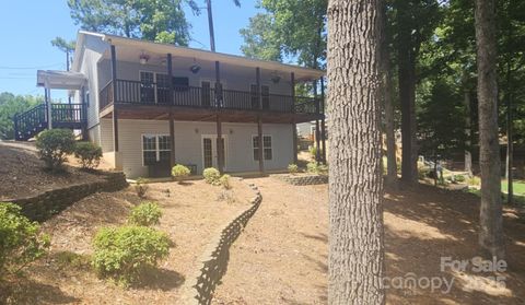 Photo of 604 Fairway Shores Road, Mount Gilead, NC 27306 (MLS # 4231642)