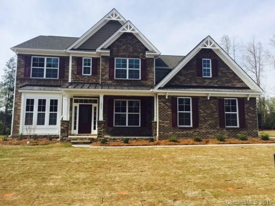 This 5 bedroom 3 bath sits on a private corner lot. Side load garage with a wooded backyard. Large granite island with gas cook top and double ovens in the kitchen.