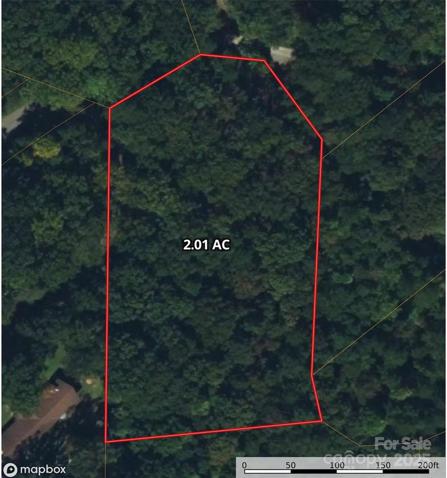 Large wooded 2.01 ACRE LOT for sale in Kings Mountain North Carolina that borders Crowders Mountain State Park and has mountain views and lots of privacy.  This lot has been in the sellers family for over 50 years and has never been built on and has original old growth hardwood trees throughout.  The lot is in a community with large lots and homes from $300k to $800k.  The lot has easy access to I-85 and Hwy. 74.  Original survey is available.  New aerial drone photos coming soon.