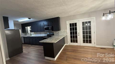 Photo of 210 Bleynat Street NE, Valdese, NC 28690 (MLS # 4393221)