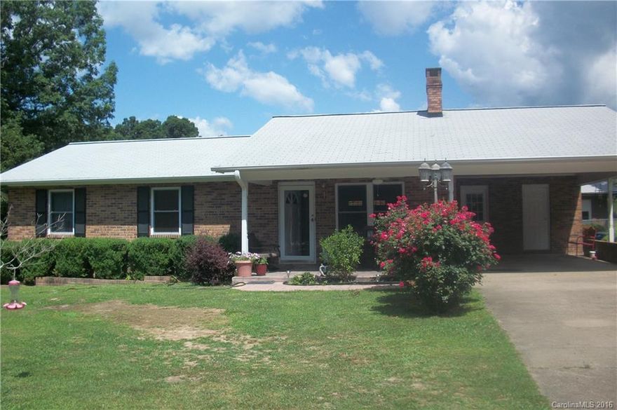 New kitchen, appliances, quartz counter top. Mag.wood floor in dr & kit. Frpl, new windows, roof 3 yrs old. Spacious laundry rm with sink. Sec sys w/cam. Frame building and block garage. Carport. Double lot. Above ground pool.