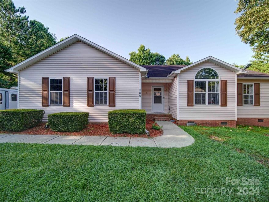 Welcome to 105 W Panther Creek Road, a beautifully updated and serene property nestled in the heart of Troutman, NC. This charming residence combines modern comforts with the tranquil allure of country living.
As you approach this inviting home, you'll be greeted by a well-maintained exterior and mature landscaping. Step inside to discover an open and airy layout. The spacious living area features high ceilings, abundant natural light, creating an ideal space for relaxation and entertaining.
The kitchen is features stainless steel appliances, and ample cabinetry. Whether you're preparing a casual meal or hosting a gathering, this kitchen provides functionality.
The property includes generously sized bedrooms, each thoughtfully designed to offer privacy and comfort. The primary suite features a walk-in closet and an en-suite bathroom featuring a soaking tub and separate shower.
Don’t miss the opportunity to make this charming property yours. NOW OFFERING 4,000 flooring allowance!!