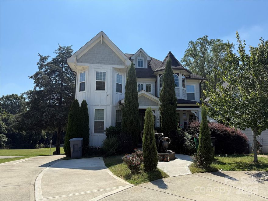 Welcome to this stunning three-story residence located in the highly sought-after Plaza Midwood neighborhood, one of Charlotte’s most vibrant and dynamic communities. This home offers a rare combination of size, character, and modern functionality, making it a standout choice for anyone looking to enjoy all the best that in-town living has to offer. With its thoughtful design and spacious floor plan, this property is perfect for both everyday living and entertaining on a grand scale.

As you arrive, you are immediately greeted by impressive curb appeal and a sense of timeless style. The front entry is framed by attractive landscaping and a welcoming walkway that leads to the home’s elegant façade. A highlight feature of this property is the beautifully designed fountain, which not only serves as a unique focal point but also creates a serene and inviting atmosphere from the moment you step onto the grounds.

Inside, the home unfolds across three expansive levels. The main floor is designed for versatility and comfort, offering an open yet functional layout that easily accommodates today’s lifestyle needs. A bonus room on the main level adds tremendous value, serving as the perfect space for a home office, guest room, media space, or playroom—tailored to fit your needs. Natural light flows throughout, enhancing the warm tones and stylish finishes that define each space.

The heart of the home is the kitchen and living area, designed with both everyday use and entertaining in mind. Whether you’re hosting friends or enjoying a quiet evening at home, the flow between these rooms makes it easy and comfortable. The living spaces open seamlessly to the outdoors, where you’ll discover one of the most impressive features of this property—a large backyard that is exceptionally rare for this neighborhood. Whether you envision it as a play area, garden retreat, or space for gatherings, the backyard offers endless possibilities and provides a sense of privacy and openness that enhances the overall living experience.

Upstairs, the additional levels provide ample bedroom space and flexibility. Each room is well-proportioned, with large windows that bring in light and views of the surrounding area. The upper floors allow for separation between living and sleeping areas, offering privacy for family members or guests. The thoughtful layout ensures that this home can adapt to your changing needs over time, whether you require extra bedrooms, creative space, or a quiet retreat.

Beyond the property itself, the location cannot be overstated. Plaza Midwood is one of Charlotte’s most desirable neighborhoods, beloved for its walkable streets, historic charm, and thriving social scene. Just minutes from your front door, you’ll find an incredible mix of dining, shopping, coffee shops, breweries, and nightlife options. Whether you’re in the mood for a quiet brunch, a lively evening out, or boutique shopping, Plaza Midwood offers it all. Parks and green spaces are also nearby, making it easy to enjoy the outdoors without leaving the neighborhood.

This home is not only about space and location—it’s about lifestyle. Imagine starting your day with coffee by the fountain, working or relaxing in your main-level bonus room, and ending the evening entertaining in your expansive backyard. Every detail of this home has been designed to provide comfort, convenience, and the opportunity to create lasting memories.

With its rare combination of a three-story design, unique architectural features, a bonus main-level room, and an expansive backyard oasis, this property stands out as one of the most desirable homes available in Plaza Midwood. Don’t miss the opportunity to make it yours and experience firsthand why this neighborhood and this home offer such an exceptional quality of life.