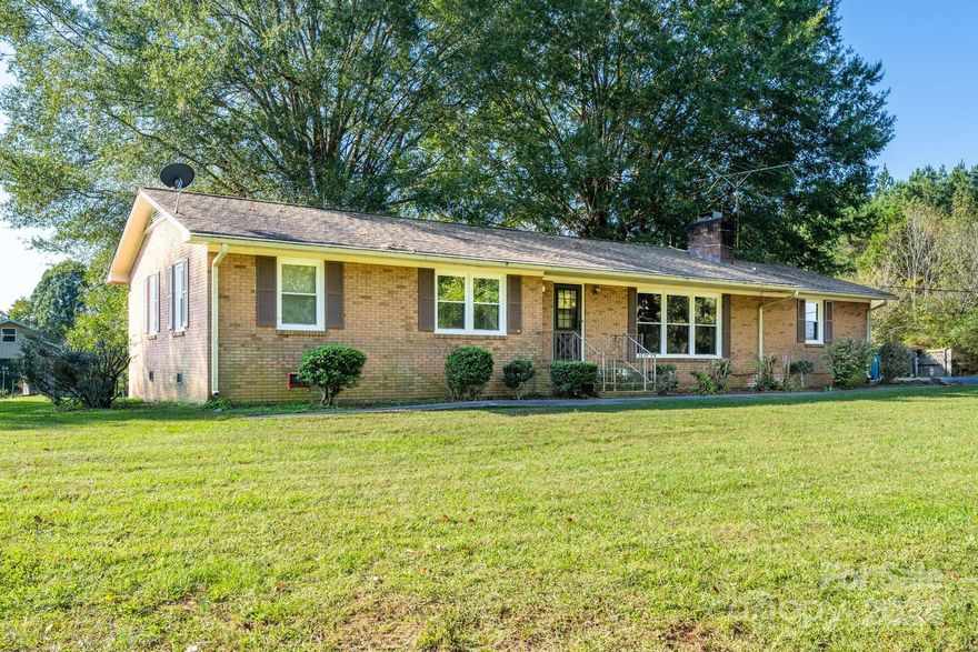 They are selling as-is. It is back on the market at no fault of the seller. This one-story home Full Brick sits on 2.06 acres, 3 bedrooms, 2 full bathrooms, a horse barn, pasture, hay storage, stable, tack room, pole barn, and workshop. Windows replaced 2023, water heater 2022, Heat pump 2011, alarm system, Roof 2007, and gutter guards. Gas heater in the living room. There is no septic permit on file. 2 Refrigerators convey one in the kitchen and one in the laundry room. With some work, this home will be a gem! Excellent location for country living! Great Investment Property!