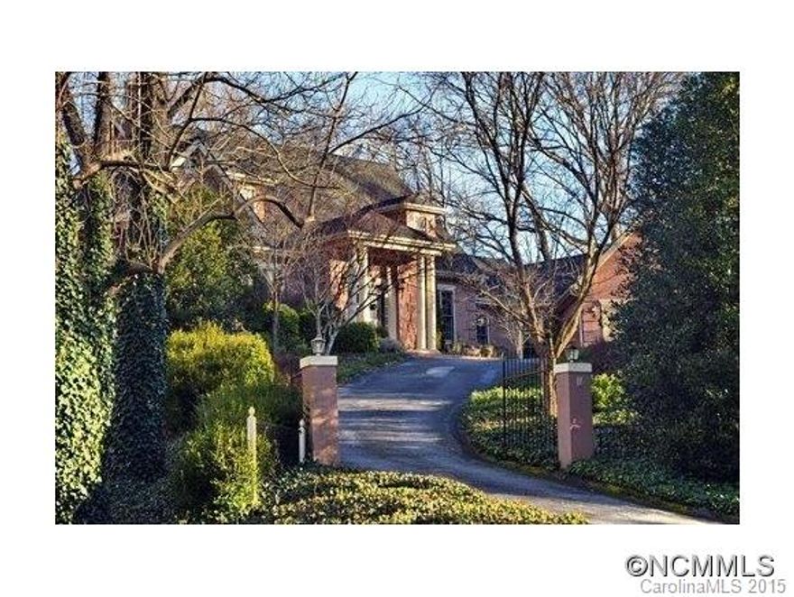 Elegant flow with large floor to ceiling windows overlooking a bold stream and professionally landscaped lawn, this 4100sf home boasts a private master on the main suite and two guest rooms with updated baths plus a large lower level great room and a two car attached garage with storage.   Located in a private North Asheville neighborhood this home is 10 minutes from downtown and a mile from the grocery store but feels like a faraway retreat.